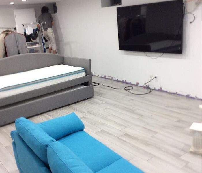  Basement and sofas with laminate flooring
